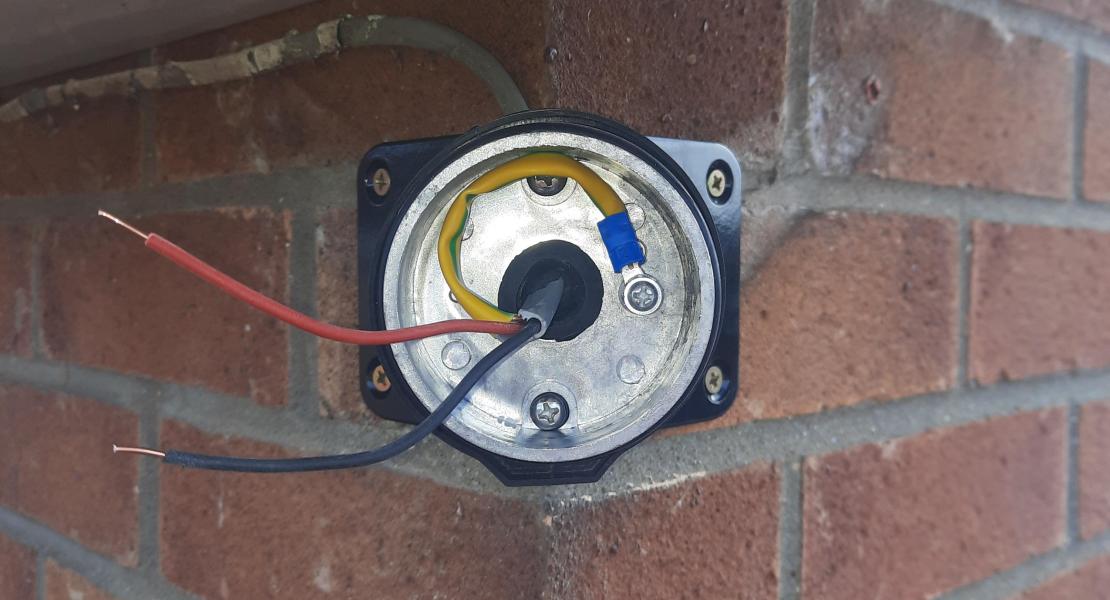 Corner mounted outside light base, showing connections.